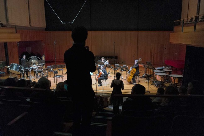 All players slowly emerging from the back of the hall. Playing & walking through the audience, making our way to the stage! Favourite part of my Concerto!