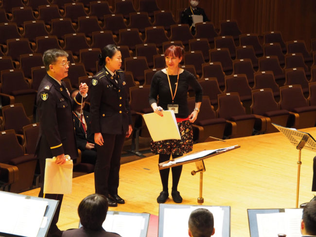 In rehearsal: Beaugeais with Conductor Colonel Takahiro Higuchi & Saxophonist/translator Haruka Ogata